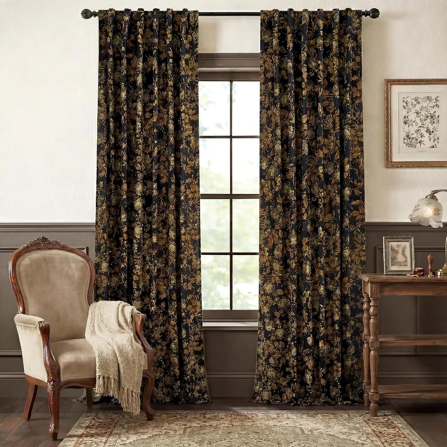Black and gold botanical curtains in a traditional living room by a window