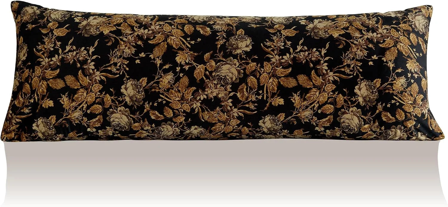Long black lumbar pillow with vintage gold floral pattern on fabric cover