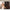 Before-and-after bedroom scene showing brown floral blackout curtains blocking harsh daylight
