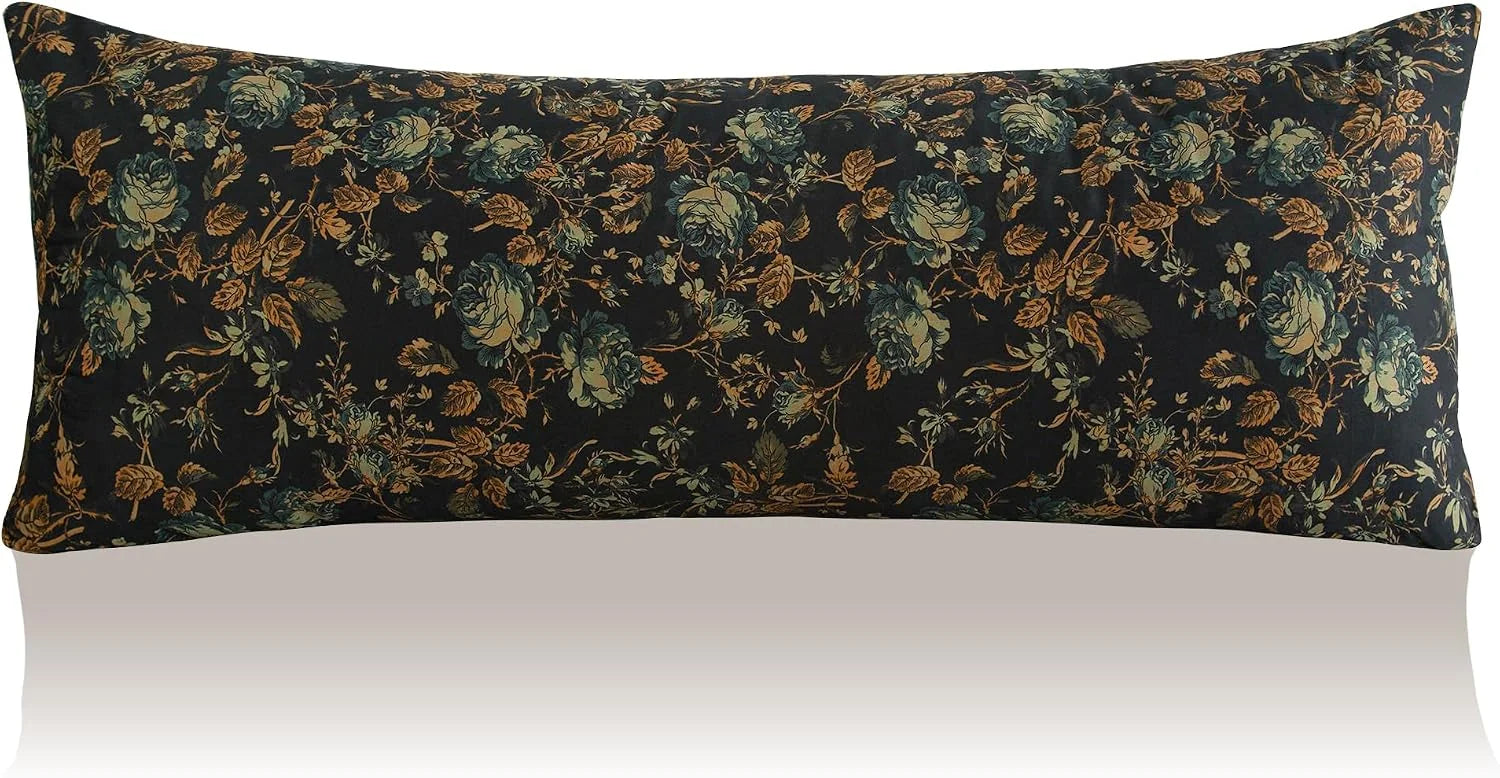Long rectangular lumbar pillow with dark botanical floral print in green and gold