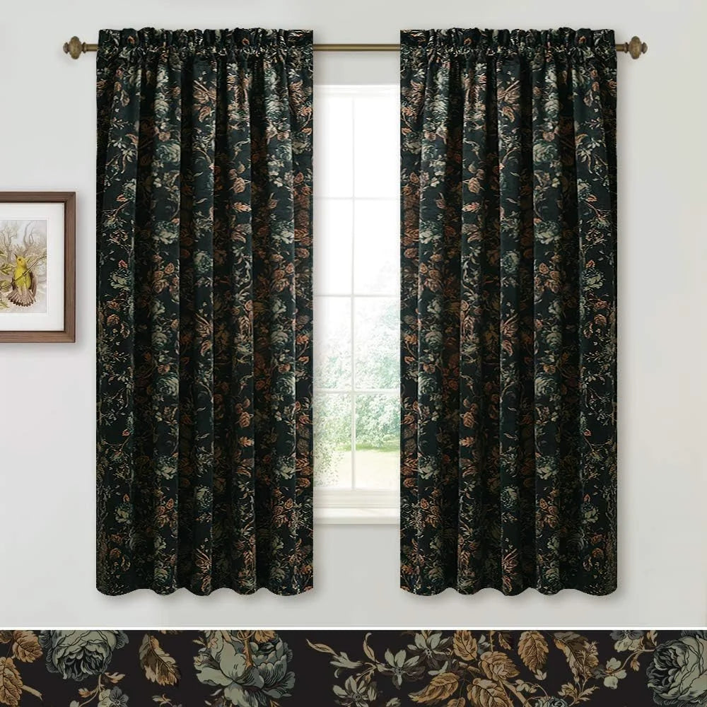 Dark floral curtains with gathered header hanging on a brass rod by a bright window
