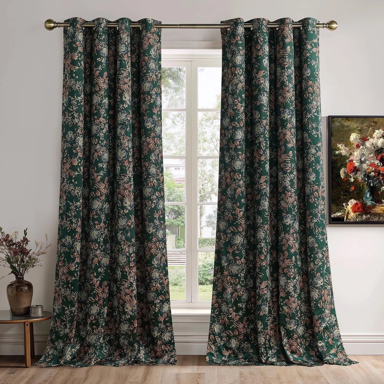 Dark green floral curtains on a brass rod framing a bright window in a classic room