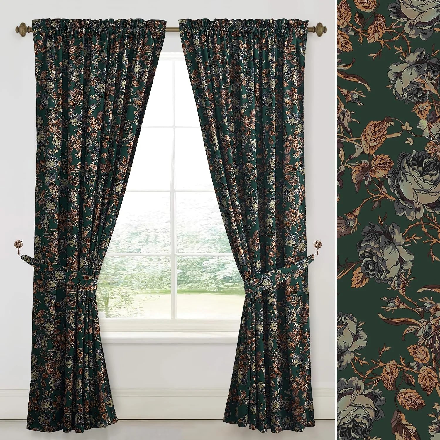 Dark green floral curtains with tiebacks hanging on a brass rod over a window