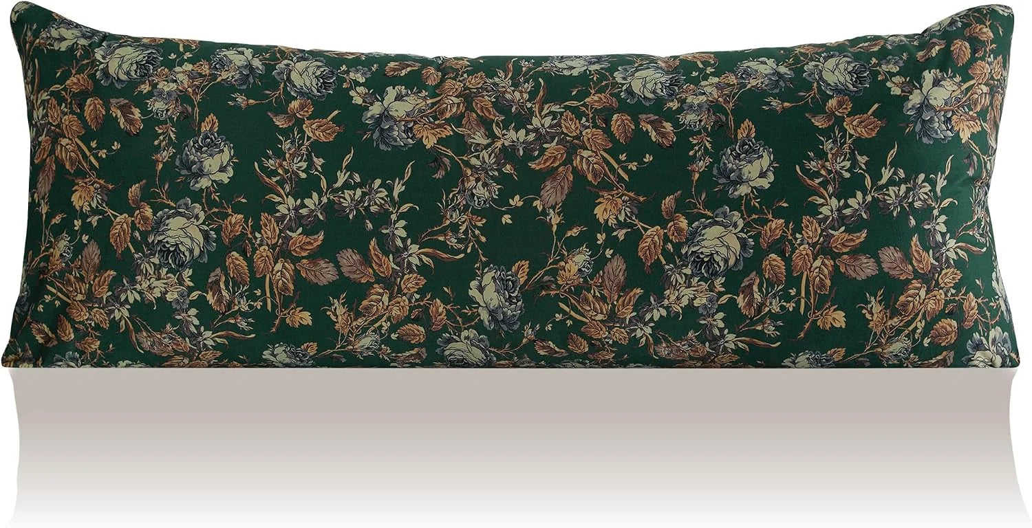Dark green lumbar pillow with vintage floral print and botanical pattern