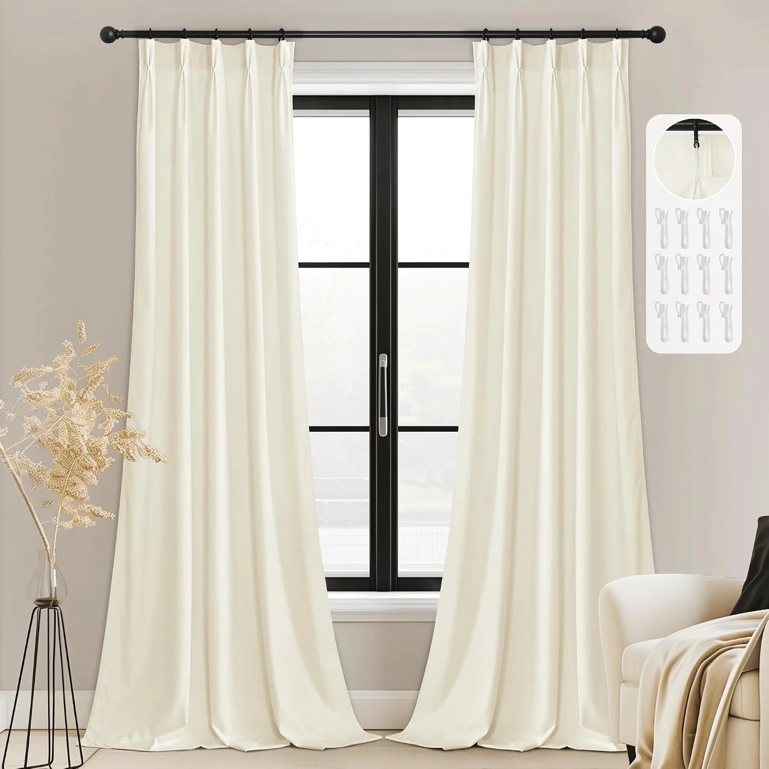 Ivory pinch pleat curtains on a black rod framing a modern black window
