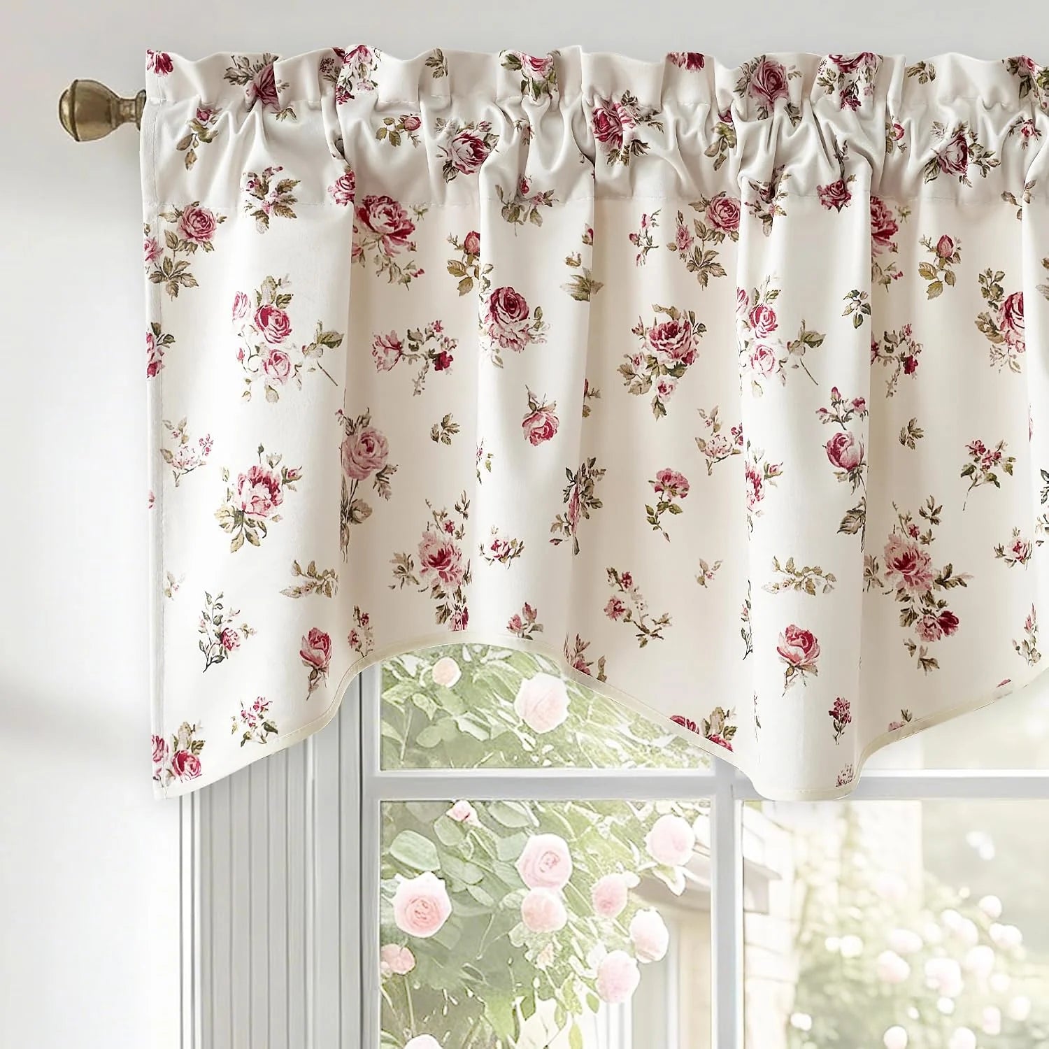 Ivory rod pocket window valance with pink rose floral print over a bright window