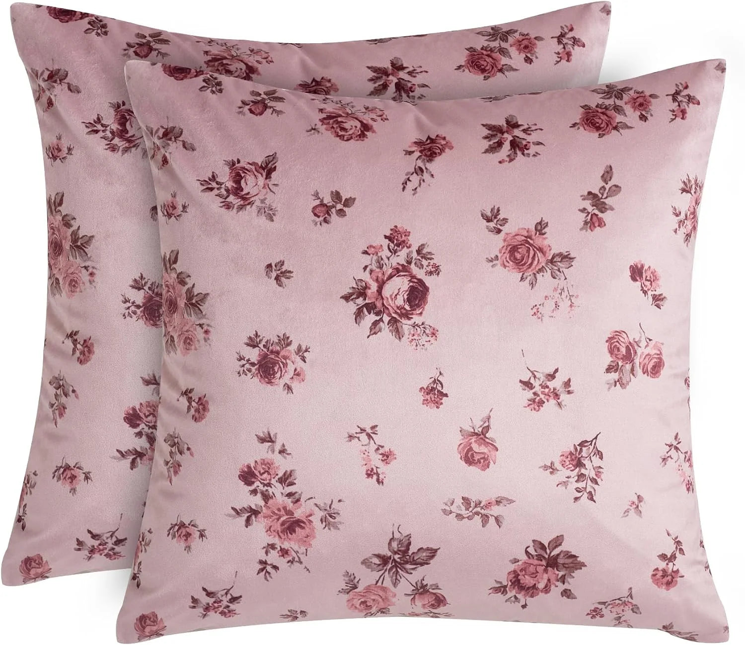 Two blush pink throw pillows with vintage rose floral print on soft velvet fabric