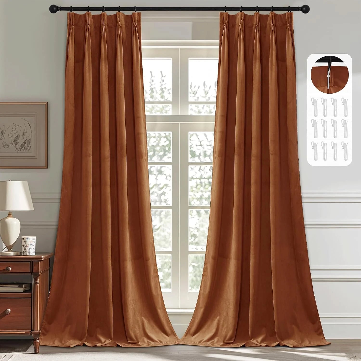 Rust brown satin curtains with pinch pleats on a black rod in a bright bedroom