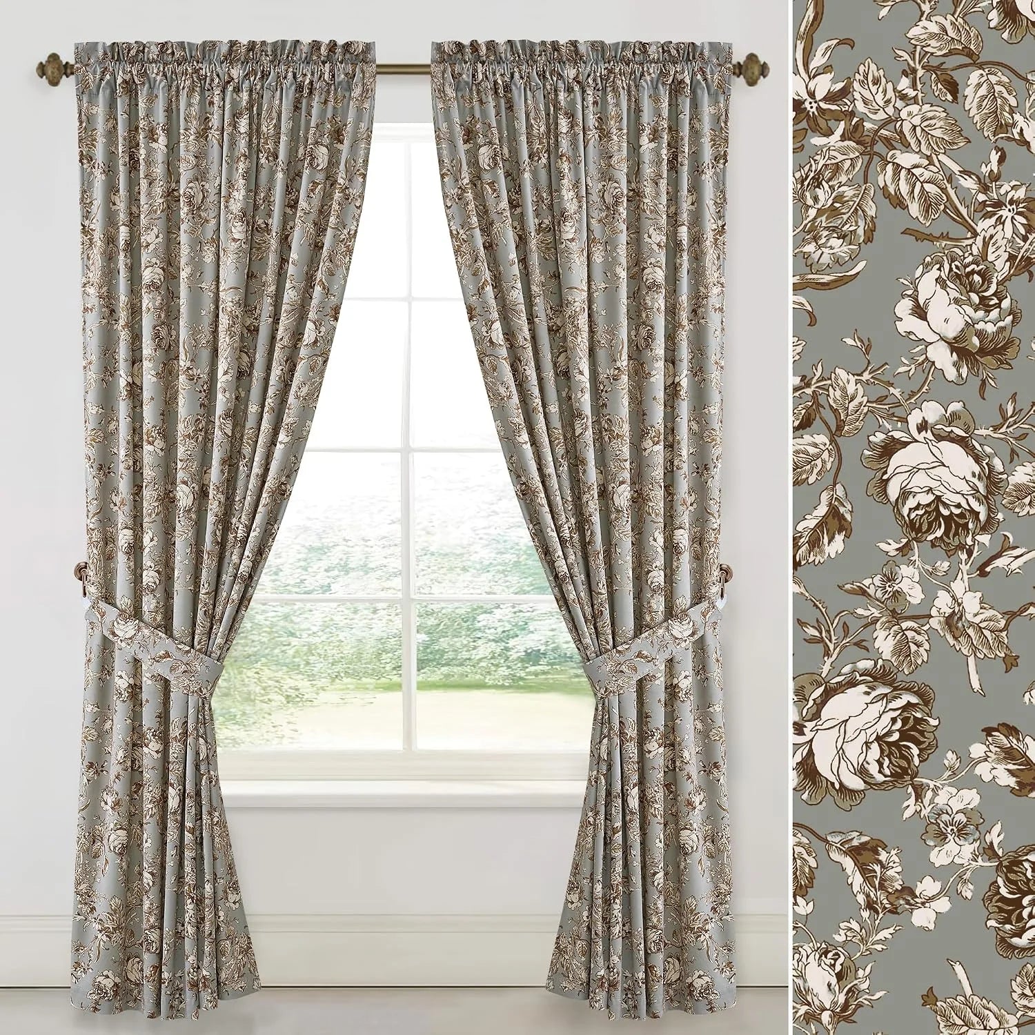 Sage green floral curtains with tiebacks hanging on a window in a traditional room