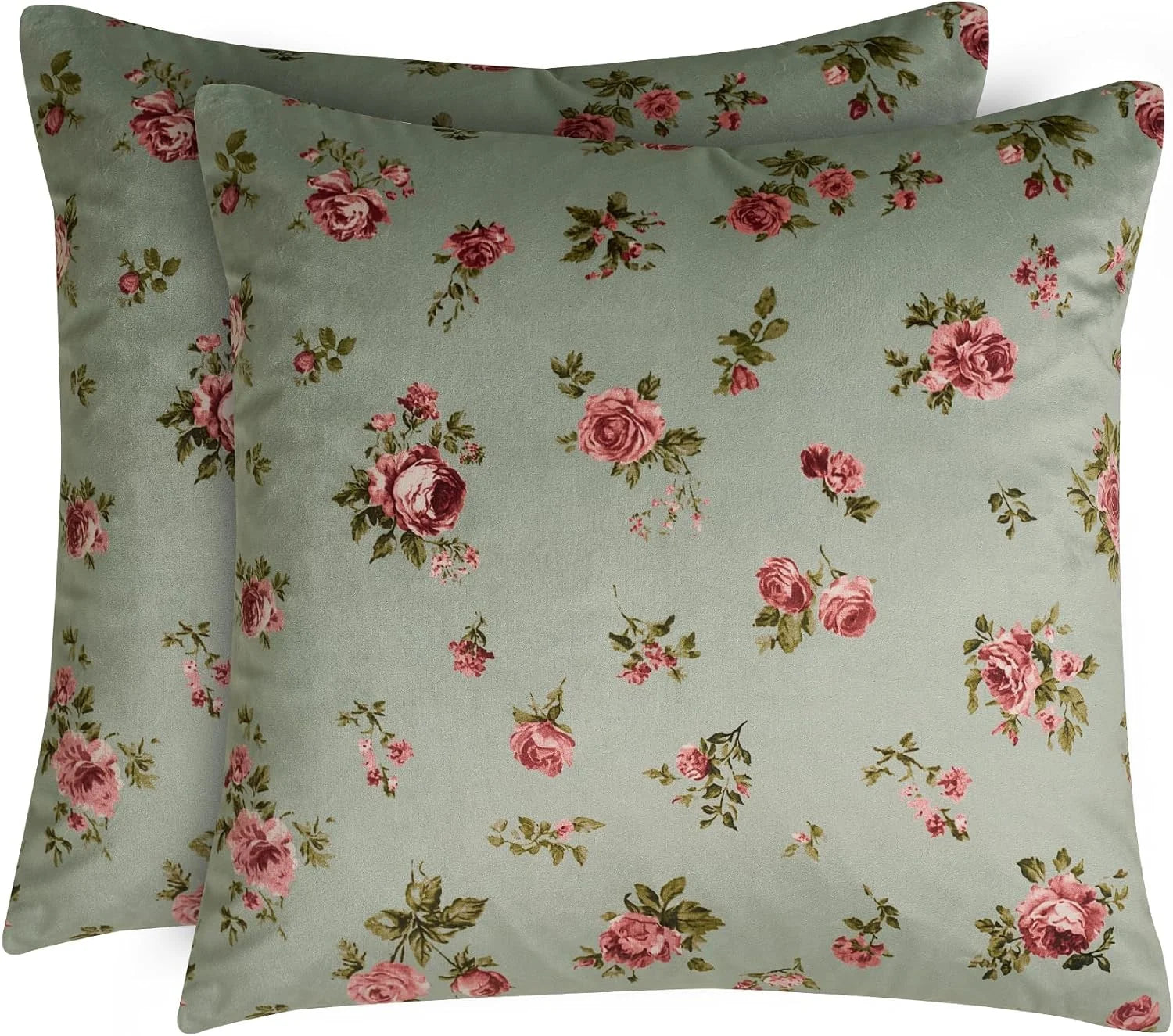 Two sage green pillow covers with pink rose floral print in vintage cottage style