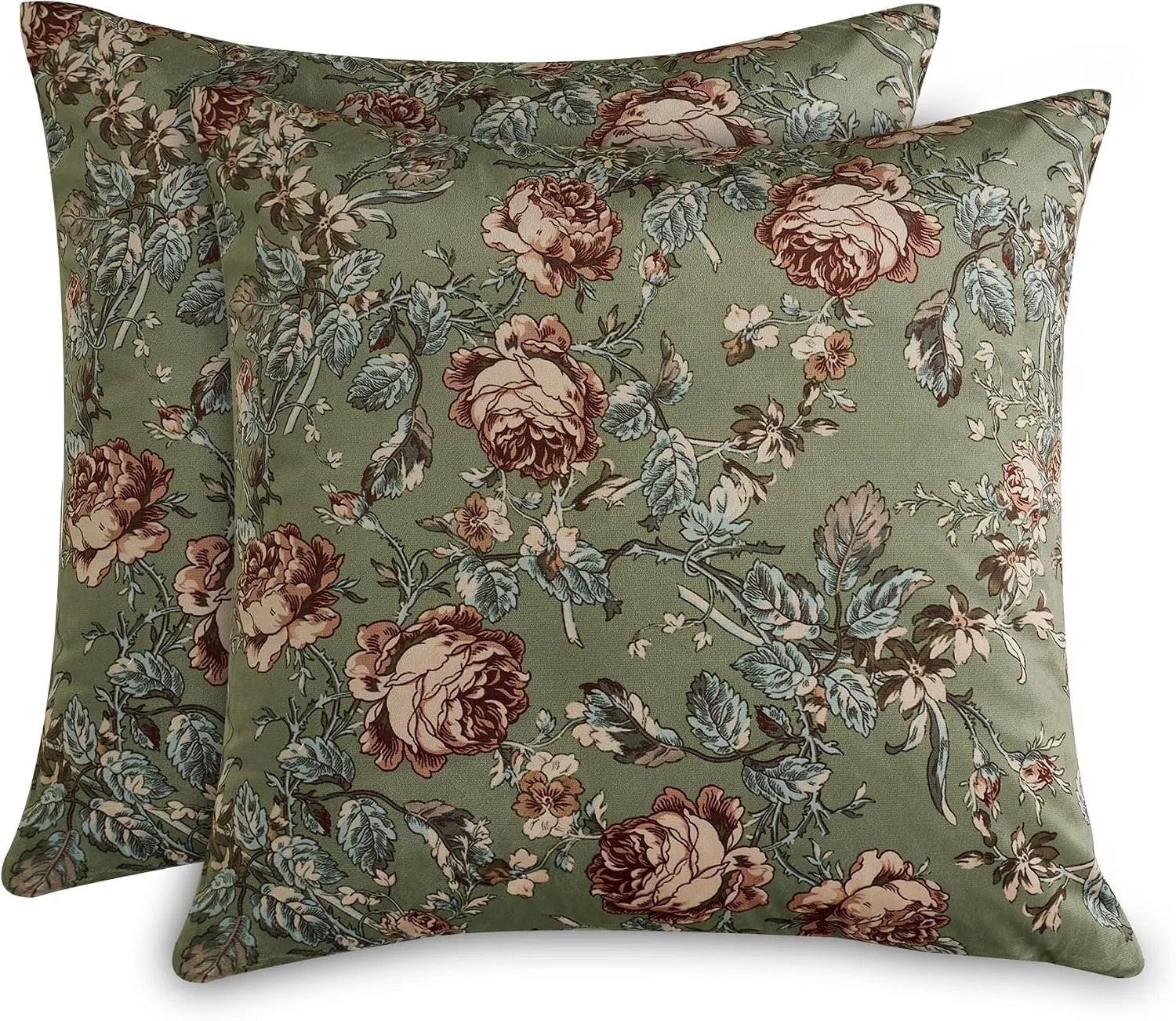 Two sage green throw pillows with vintage floral print in blush and blue tones